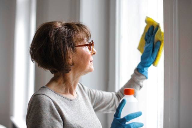 Housekeeper cleaning airbnb managed property